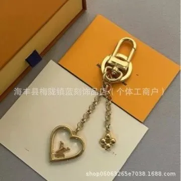 Louis Vuitton Heart Charm Keychain Gold-tone with Stamped Heart