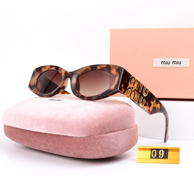 Miu Miu Sunglasses Tortoiseshell with Gold Logo Temples