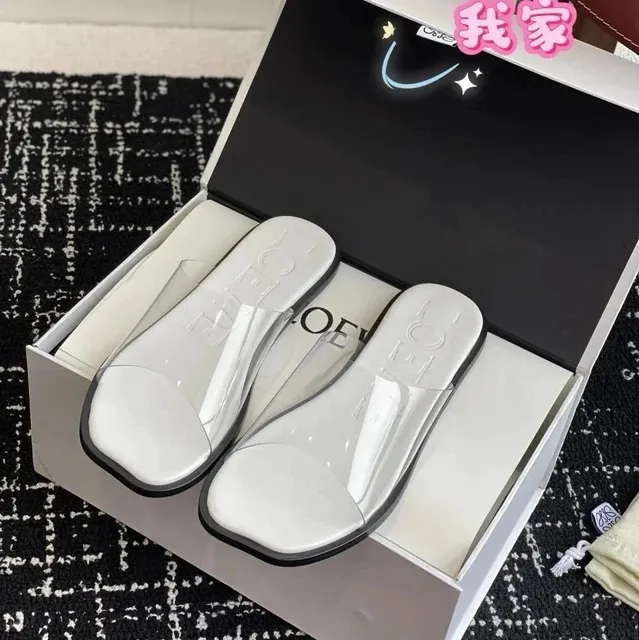 Loewe Puzzle Slide Clear Strap