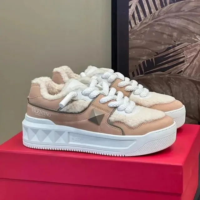 Valentino Rockstud Sneaker Shearling Trim
