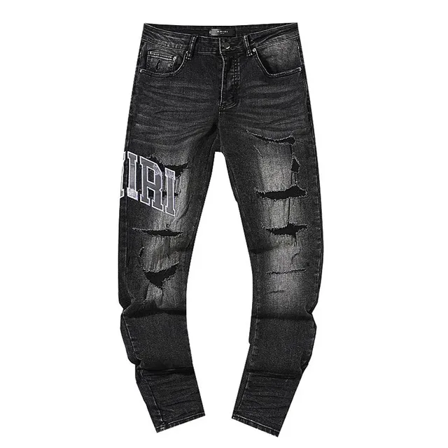 Amiri Distressed Jeans Logo Print