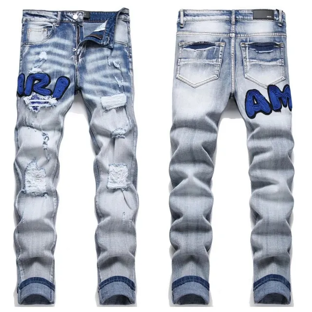 Amiri Distressed Jeans Blue Logo Patch