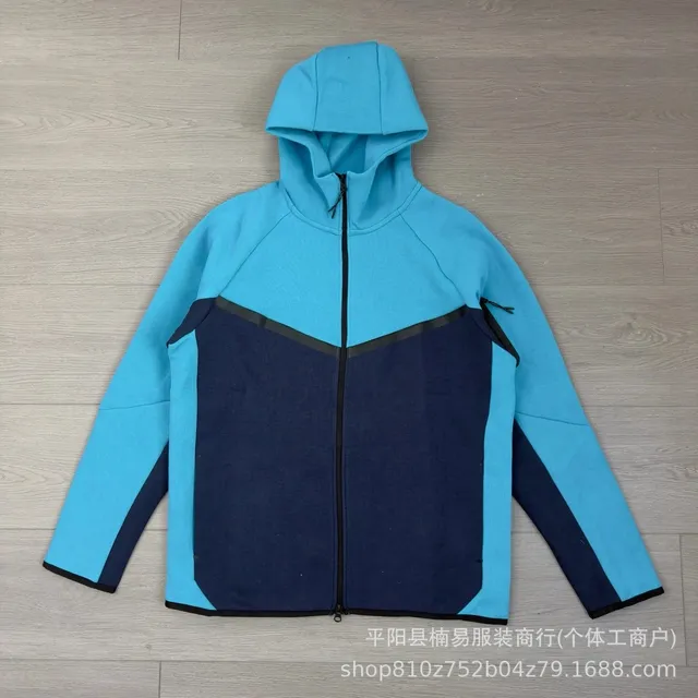 湖蓝拼藏青外套