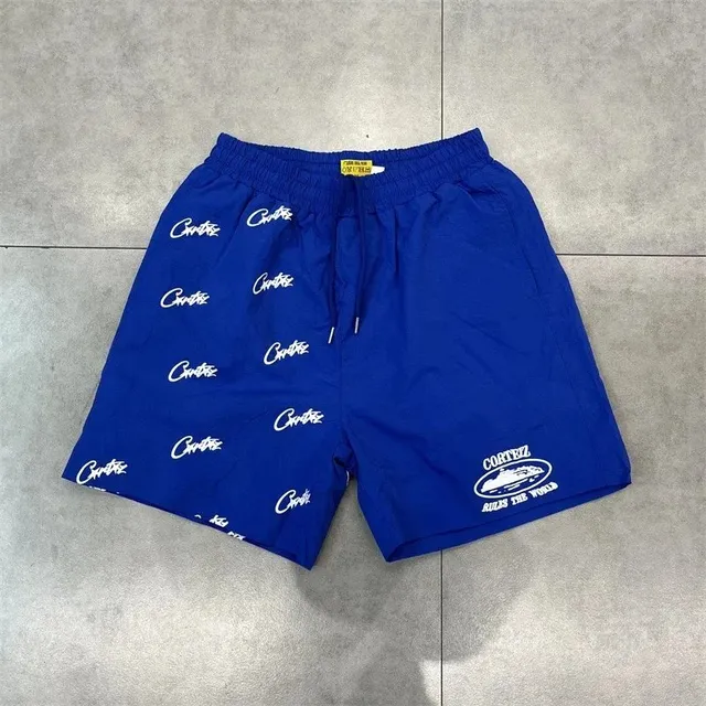 Corteiz Logo-Print Shorts All-Over Script