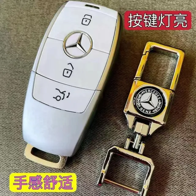 White Mercedes key with circuit board and toothed keychain