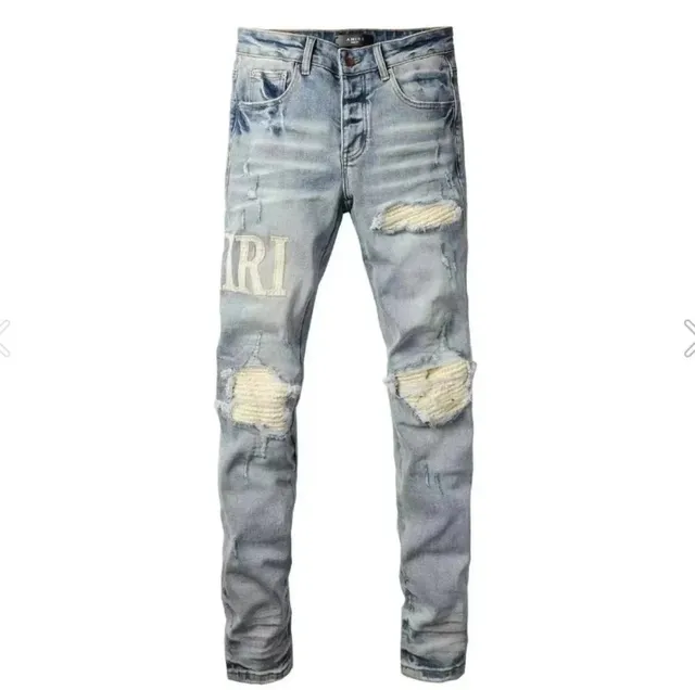 Amiri Distressed Jeans Embroidered Logo