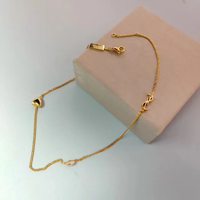 Saint Laurent Monogram Chain Necklace YSL Logo with Heart and Crystal