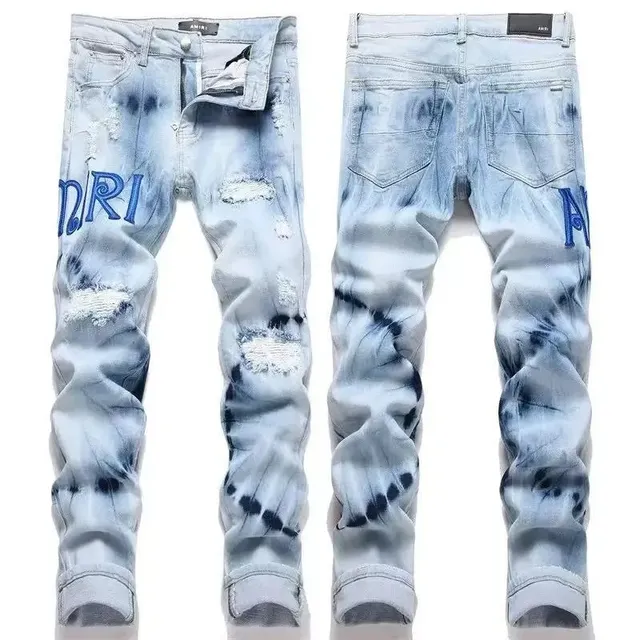 Amiri Distressed Denim Jeans Tie-Dye Print with Embroidered Logo