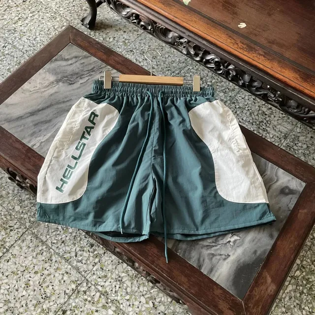 Hellstar Logo Panel Shorts Teal and White