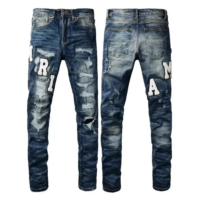 Amiri Distressed Logo Jeans Ripped with Appliqué Letters