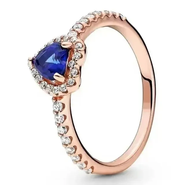 Tiffany & Co. Ring Trillion Cut Sapphire with Diamond Halo