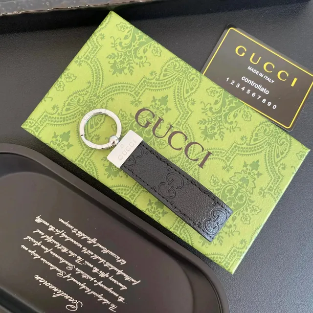 Gucci GG Leather Keychain Embossed Logo