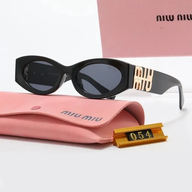 Miu Miu Oval Sunglasses Gold Logo Temple