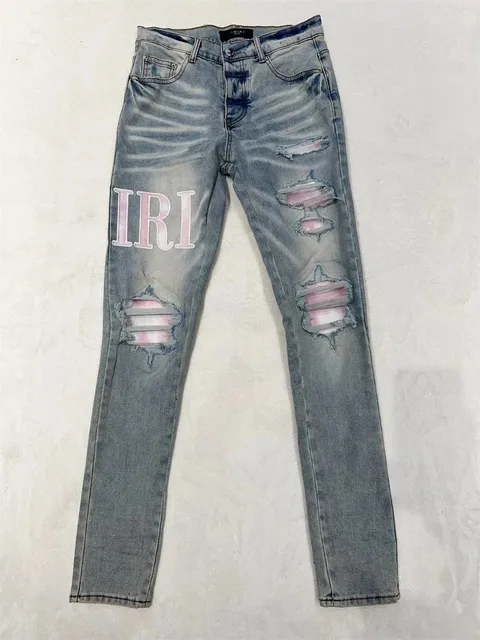 Amiri Distressed Jeans IRI Logo
