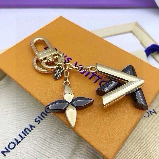 Louis Vuitton LV Arch and Flower Charm Metallic Gold and Black Resin