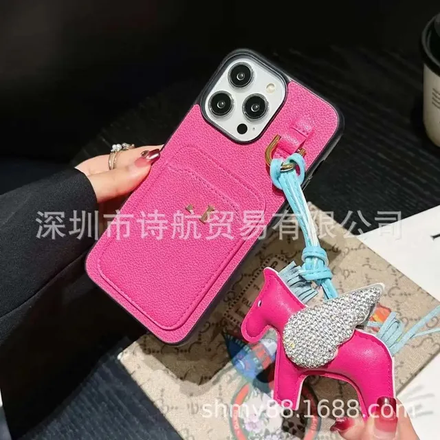 Hermès Phone Case with Cardholder and Charm Fuchsia Leather with Crystal Horse Charm