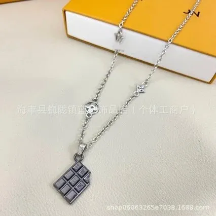 Louis Vuitton Chocolate Bar Pendant Necklace Metallic