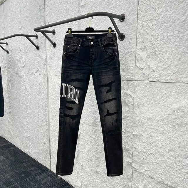 Amiri Distressed Logo Jeans Black Wash with Embroidered Logo