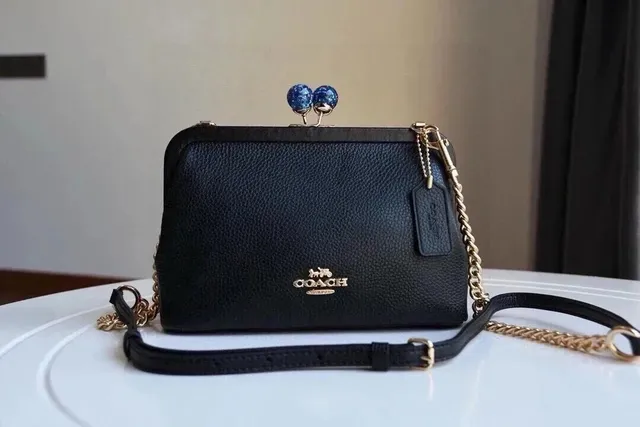 Coach Clutch with Chain Strap Blue Orb Knuckle Closure