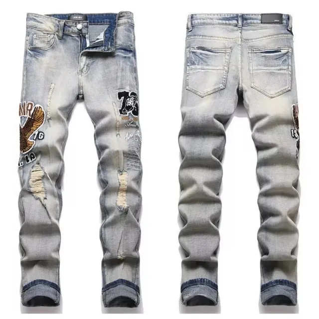 Amiri Distressed Patchwork Jeans Eagle Patch