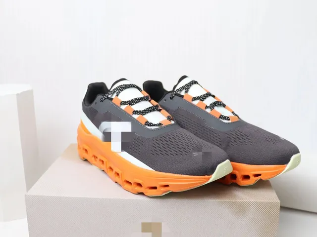 On Cloudmonster Grey Orange