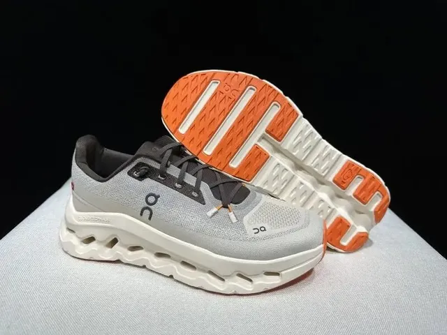 On Cloudmonster Grey Orange