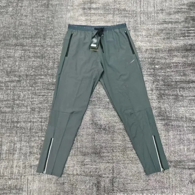 Nike Tech Fleece Joggers Reflective Zip Detail