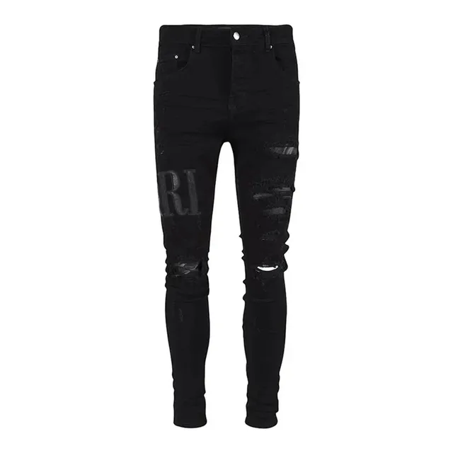 Amiri Distressed Skinny Jeans Logo Print