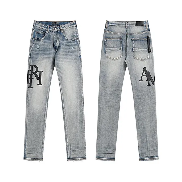 Amiri Logo Jeans Distressed Light Wash