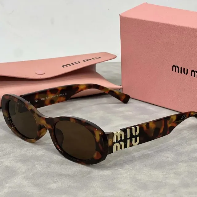 Miu Miu Oval Sunglasses Tortoiseshell