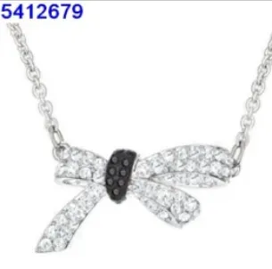 Bow black and white diamond necklace