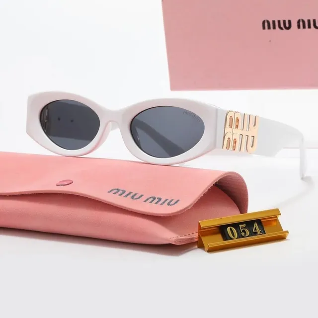 Miu Miu Oval Sunglasses Gold Logo Temple