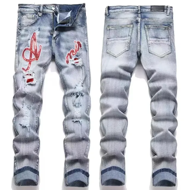 Amiri Distressed Jeans Red Logo Embroidery