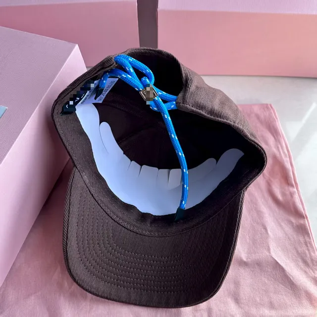 Coffee colored (light blue rope) hat brim and top are soft