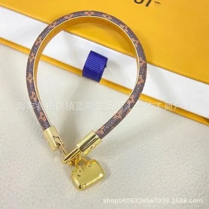 Louis Vuitton Bracelet Monogram Canvas with Gold Hardware