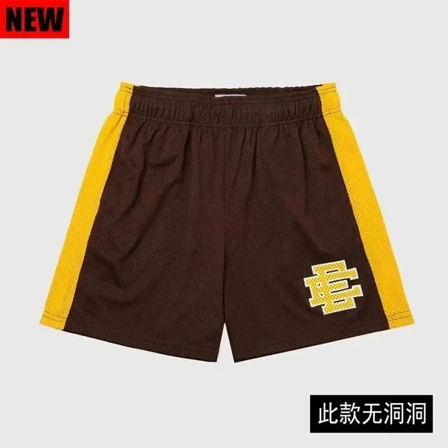 Fear of God Essentials Mesh Shorts Brown with Yellow Side Stripes