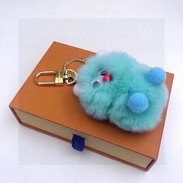 Louis Vuitton Furry Monster Keychain Turquoise with Blue Pom-Poms