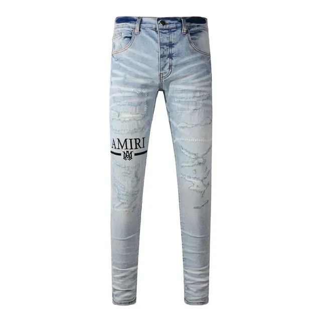 Amiri Distressed Skinny Jeans Logo Print