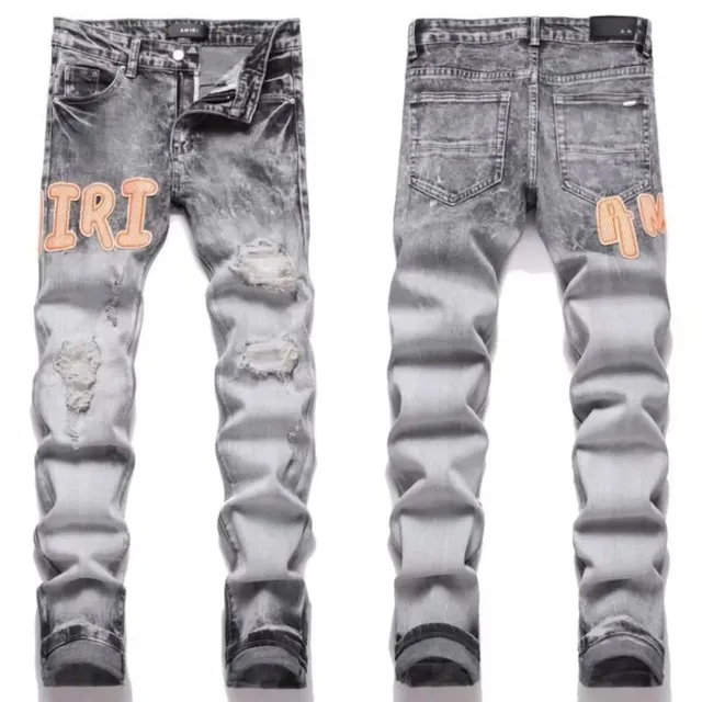 Amiri Distressed Jeans Acid Wash with Embroidered Logo