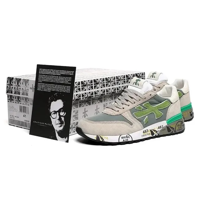 Premiata sneaker green X logo and multi-panel upper