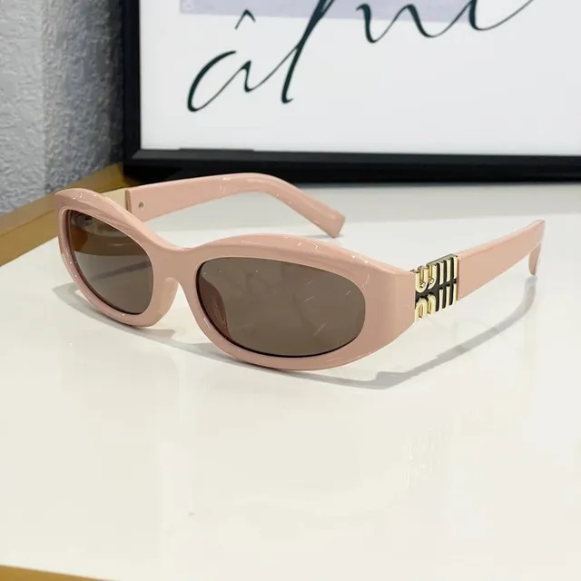 Miu Miu Oval Sunglasses Gold Logo Temples