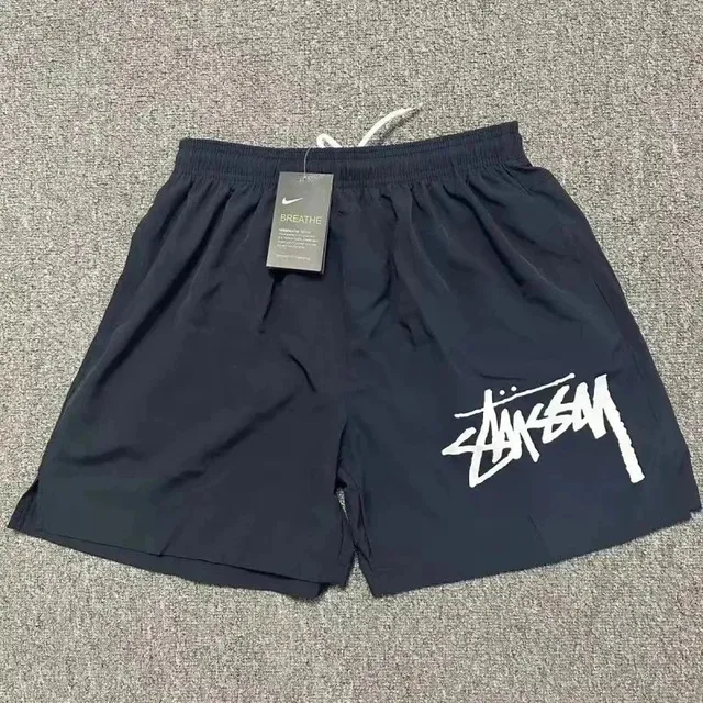 Stüssy × Nike Track Shorts Stussy Logo