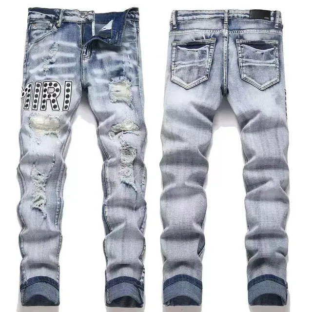 Amiri Distressed Jeans MIRI Logo Print
