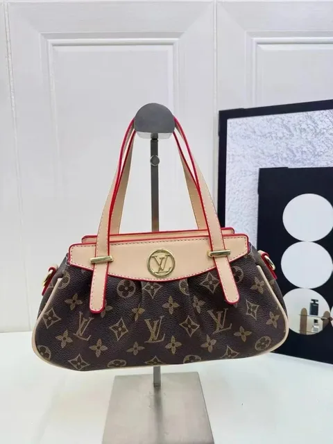 Louis Vuitton Monogram Canvas Handbag Classic LV Print with Red Trim