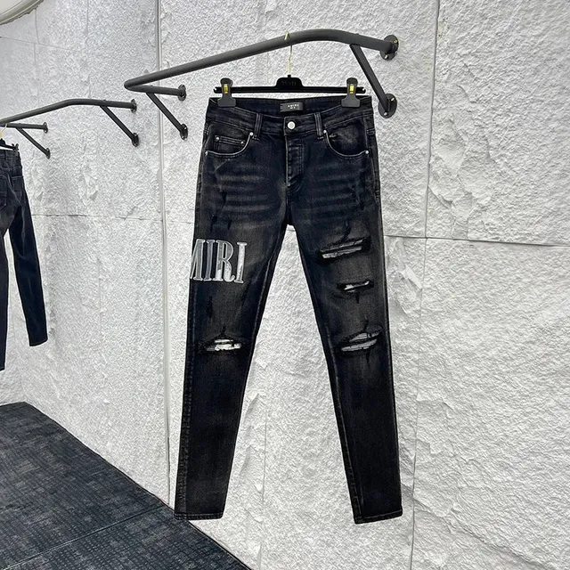 Amiri Distressed Slim Fit Jeans MIRI Logo Print