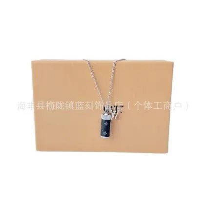 Louis Vuitton Cylinder Pendant Monogram Canvas