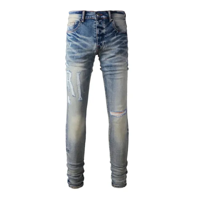 Amiri Distressed Slim Fit Jeans Faded Wash with Embroidered Lettering