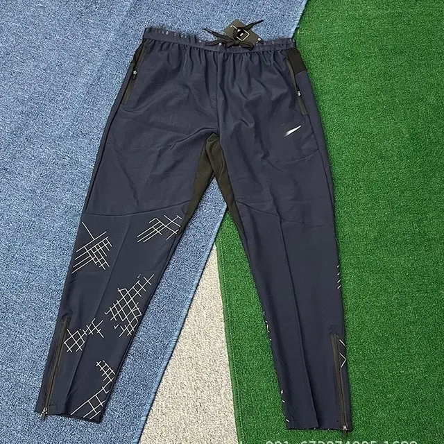 Nike Tech Fleece Joggers Grid Print
