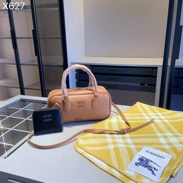 Miu Miu handbag and scarf tan handbag with 'miu miu' logo and yellow check scarf