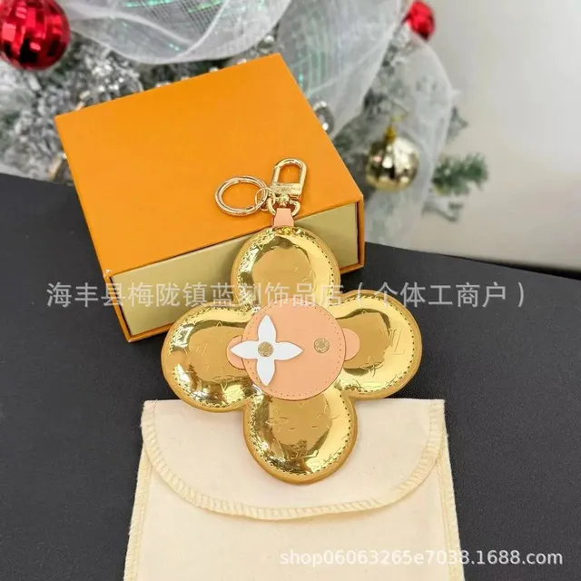 Louis Vuitton Flower Charm Metallic Gold with Leather Center